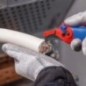 Couteau à dénuder KNIPEX® avec patin et fonction cliquet